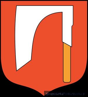 Herb Zaklikowa, nawiązujący do Topora, herbu założyciela miasta Stanisława Zakliki
